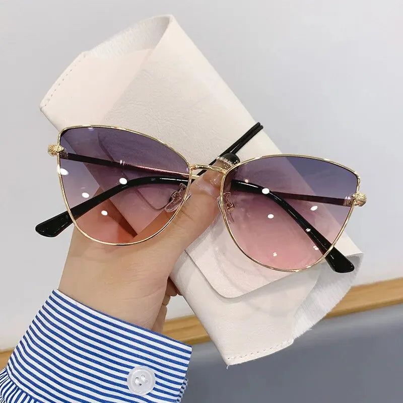 Nuevas gafas de sol estilo ojo de gato con montura pequeña de metal retro para mujer