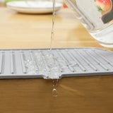 Alfombrilla de silicona para desagüe: almohadilla reutilizable y resistente al calor para cocina y baño para superficies limpias