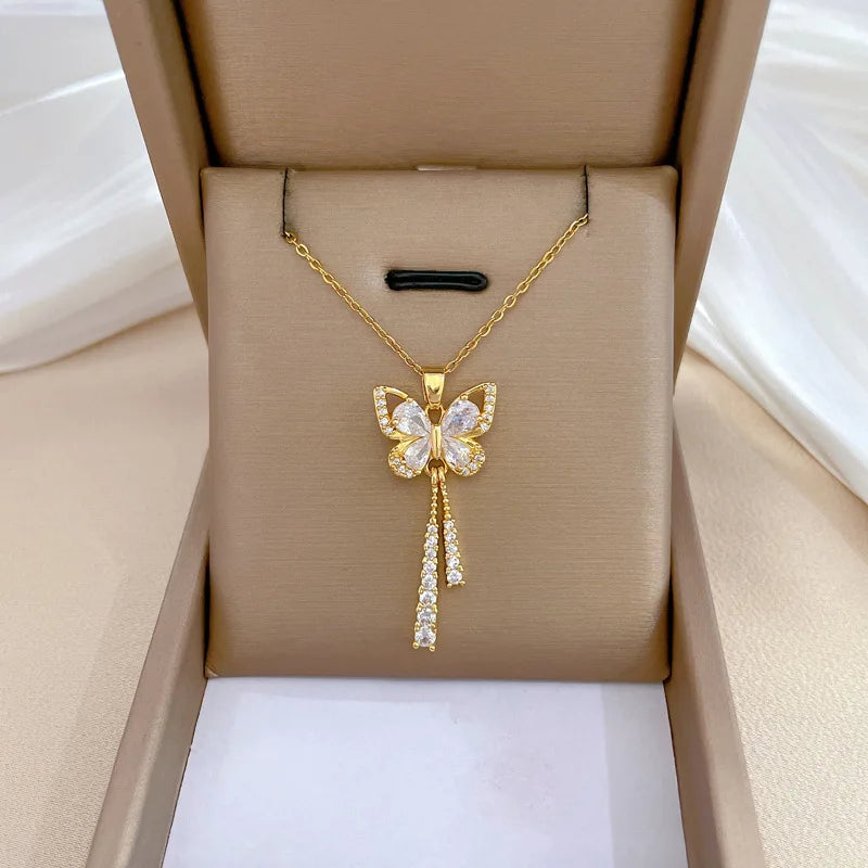 Collar romántico de mariposa con borlas blancas: joyería clásica de acero inoxidable para mujer