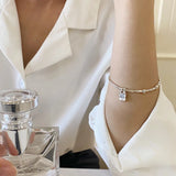Pulsera con dije de corazón vintage en plata de ley 925: joyería elegante y atemporal para mujeres