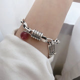 Pulsera con dije de corazón vintage en plata de ley 925: joyería elegante y atemporal para mujeres