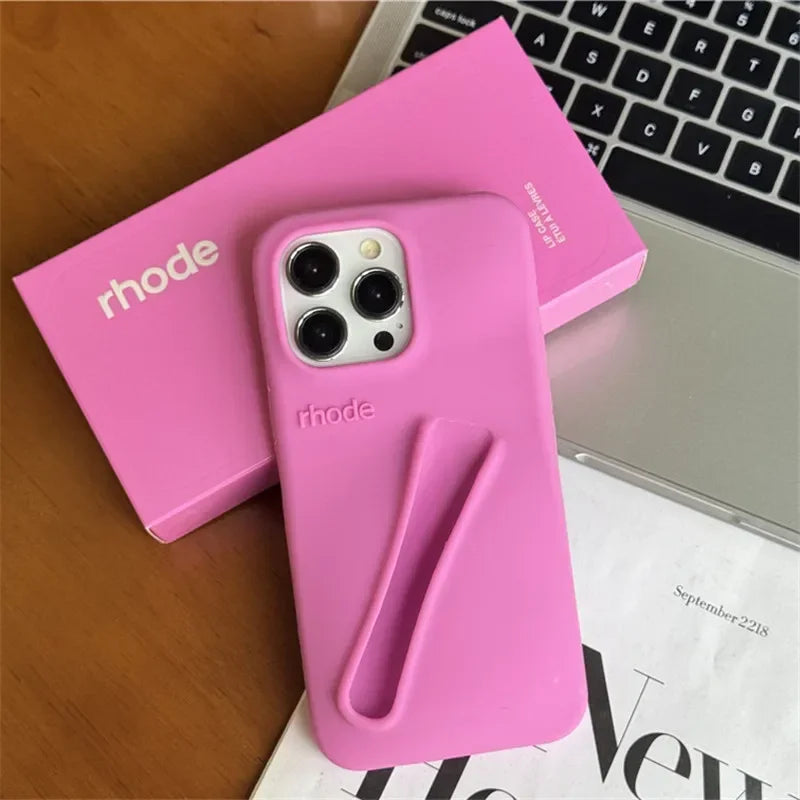 Estuche Rhode para iPhone 14 Pro y 15 Pro: funda de silicona suave con soporte para brillo de labios y lápiz labial, diseño mate y antideslizante