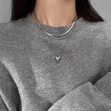 Elegante collar con colgante de corazón de doble capa: joyas modernas y elegantes para mujeres