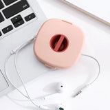 Carrete de almacenamiento de cables compacto: organizador giratorio para cables USB, de auriculares y de carga