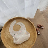 Babero de silicona con dibujos animados para bebés: babero de alimentación suave, impermeable y ajustable para niños pequeños (1 a 3 años)