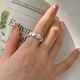 Anillo minimalista abierto con forma de corazón en plata de ley 925: elegante banda ajustable para mujer